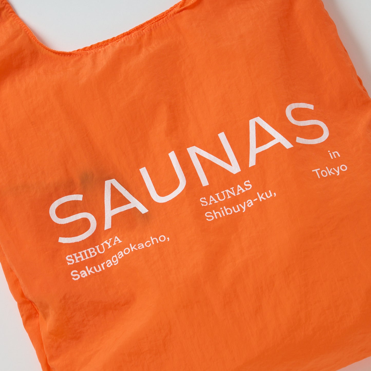 SAUNAS ロゴ ナイロンエコバッグ